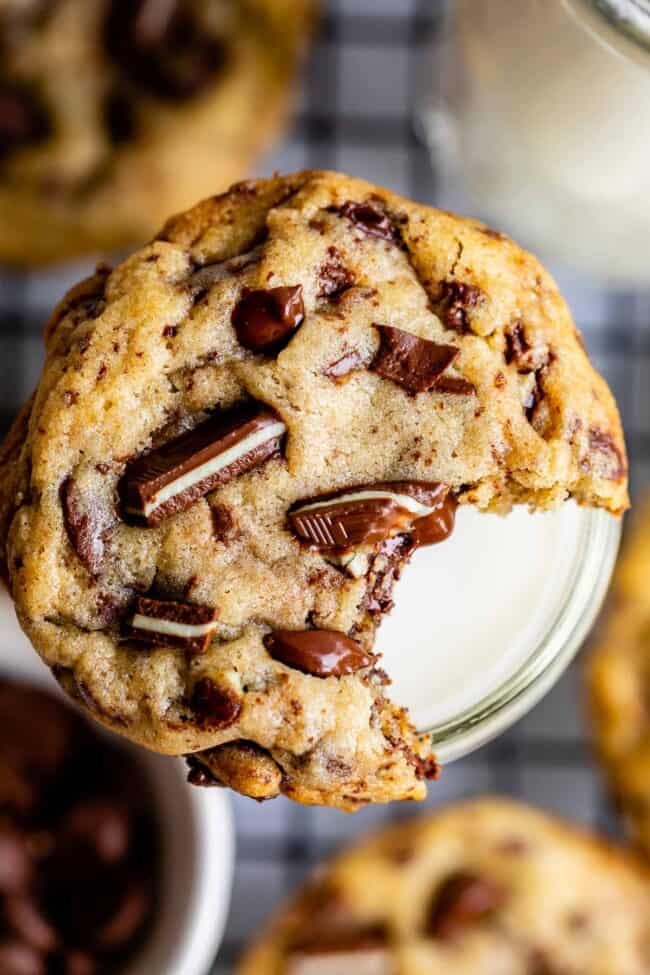 Andes mint cookie on top of a glass of milk