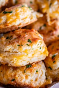 cheddar biscuit recipe with several biscuits stacked