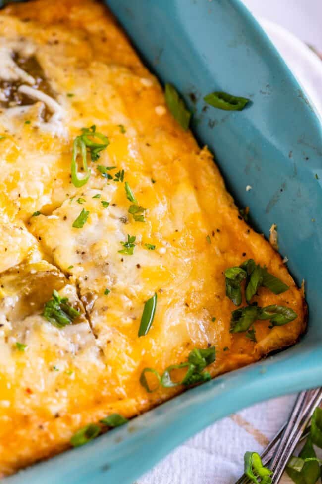 chile relleno casserole in a teal casserole dish.