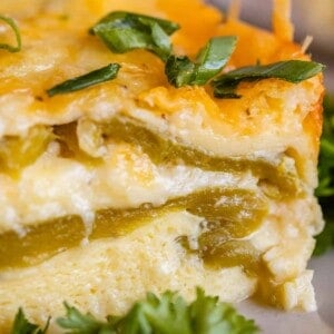 chile relleno breakfast casserole with chopped green onions on a plate