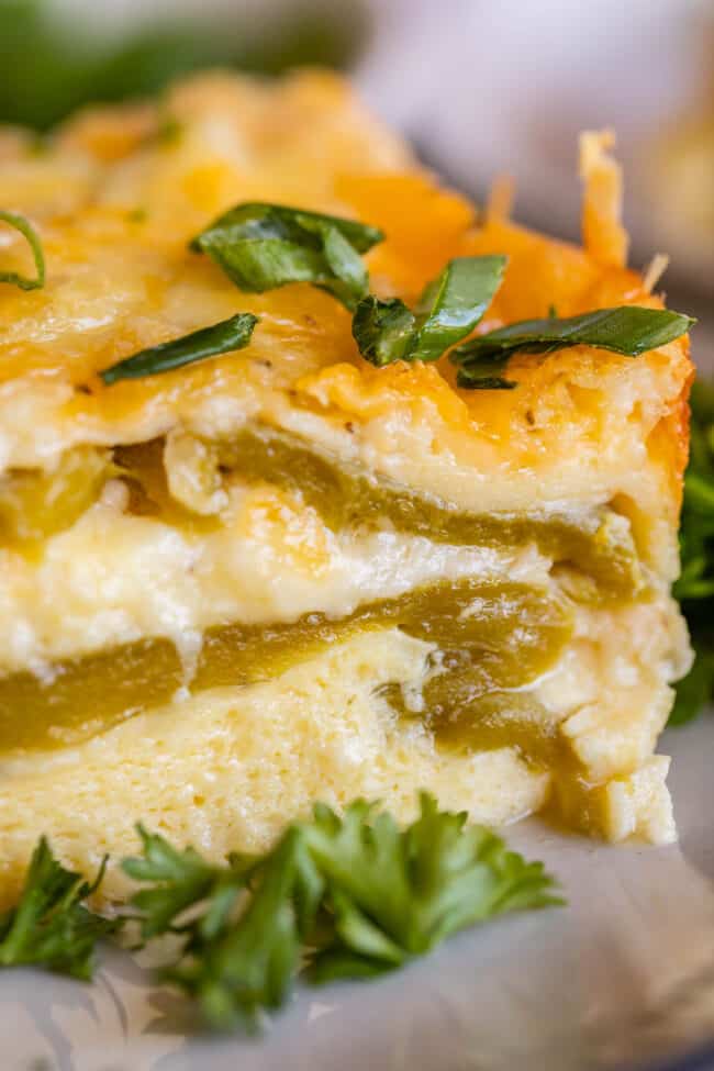 chile relleno breakfast casserole with chopped green onions on a plate