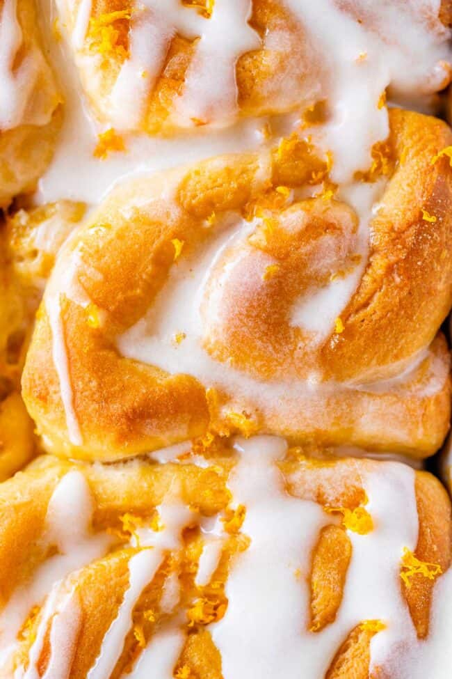 overhead close up photo of meyer lemon rolls with glaze