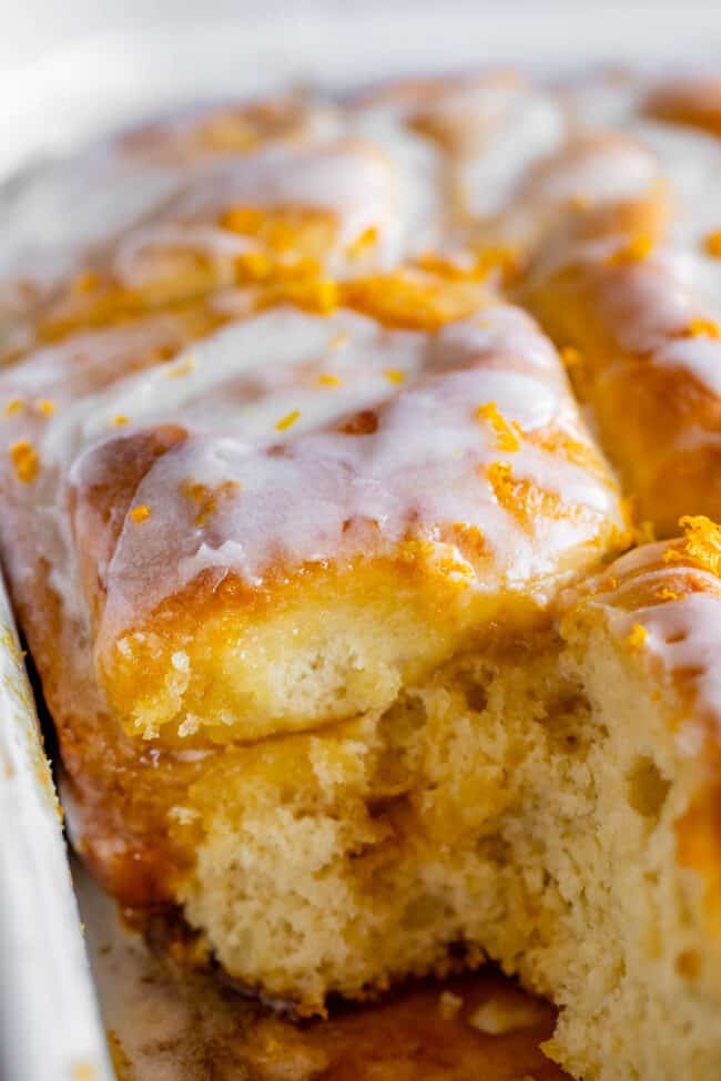 meyer lemon sweet rolls in a white pan