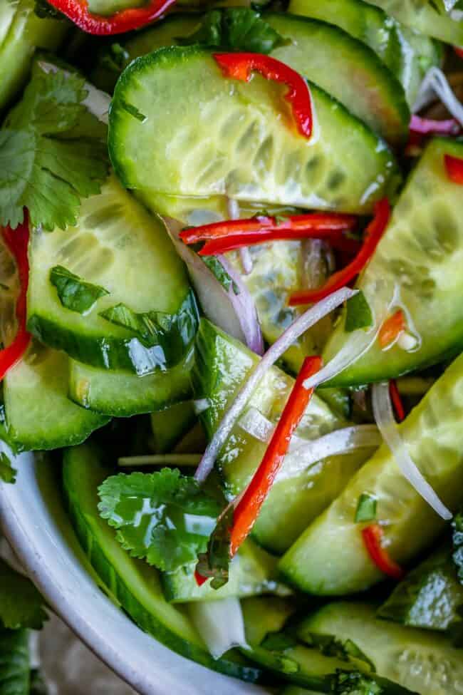 thai cucumber salad recipe with simple syrup in a white bowl