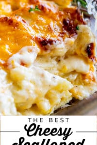 Cheesy scalloped potatoes in a glass pan