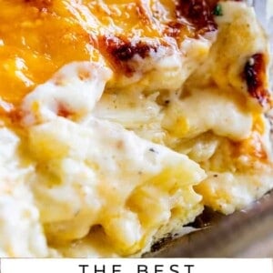 Cheesy scalloped potatoes in a glass pan