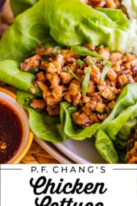 chicken lettuce wraps on a plate with sauce