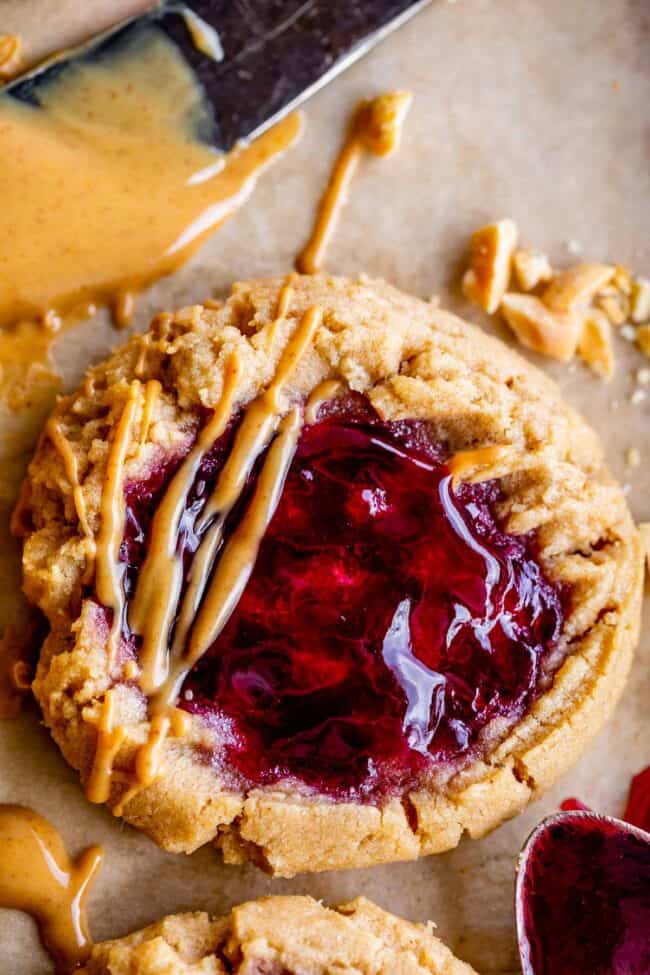 peanut butter and jelly cookies with jam on top