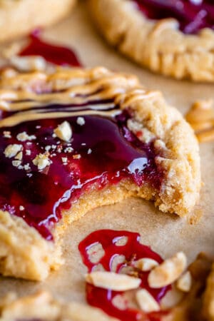peanut butter and jelly cookies with a bite taken out