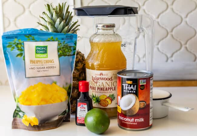 ingredients for virgin pina coladas on a counter.