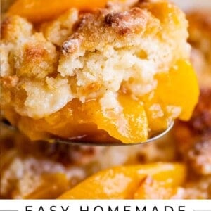 spoon lifting peach cobbler recipe from a pan