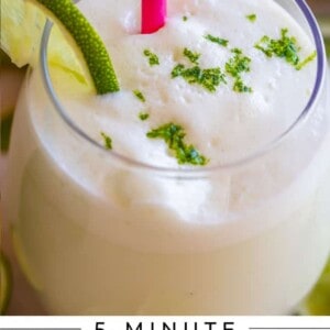 Brazilian Lemonade in a glass with a straw