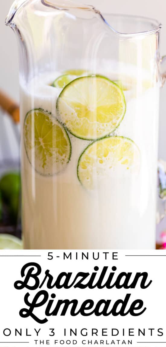Brazilian Limeade in a clear glass pitcher with lime garnish