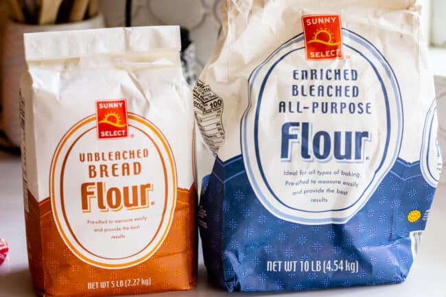 bread flour and all purpose flour in sacks on the counter