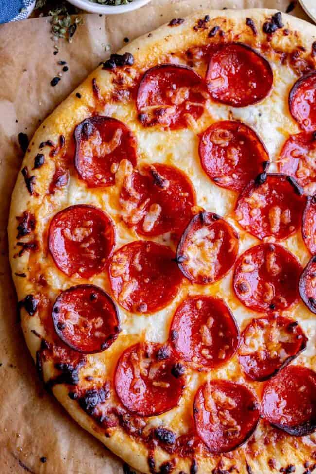 homemade pizza recipe with pepperoni, shot from overhead.