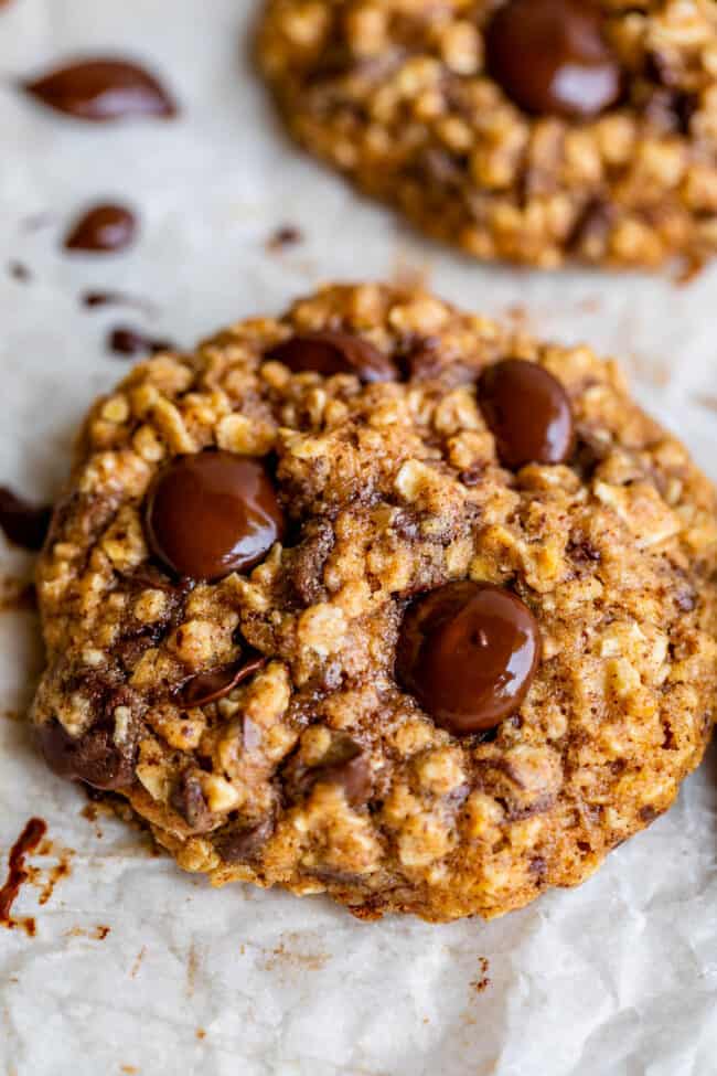 healthy oatmeal chocolate chip cookies on parchment paper.