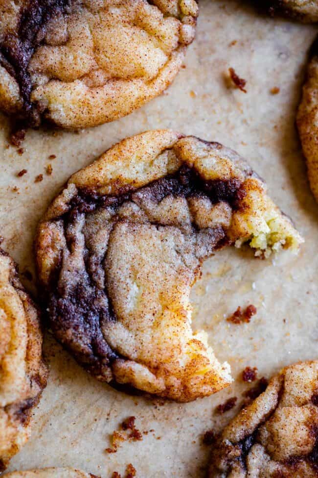 cinnamon snickerdoodles with cinnamon swirl with a bite taken out