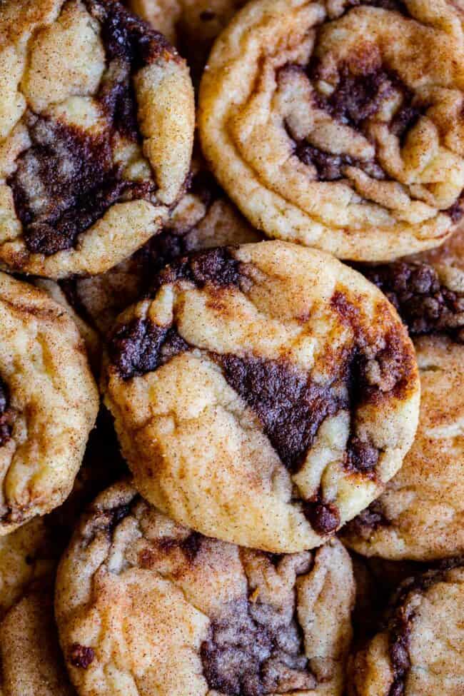 cinnamon roll cookies on a pan layered together from overhead