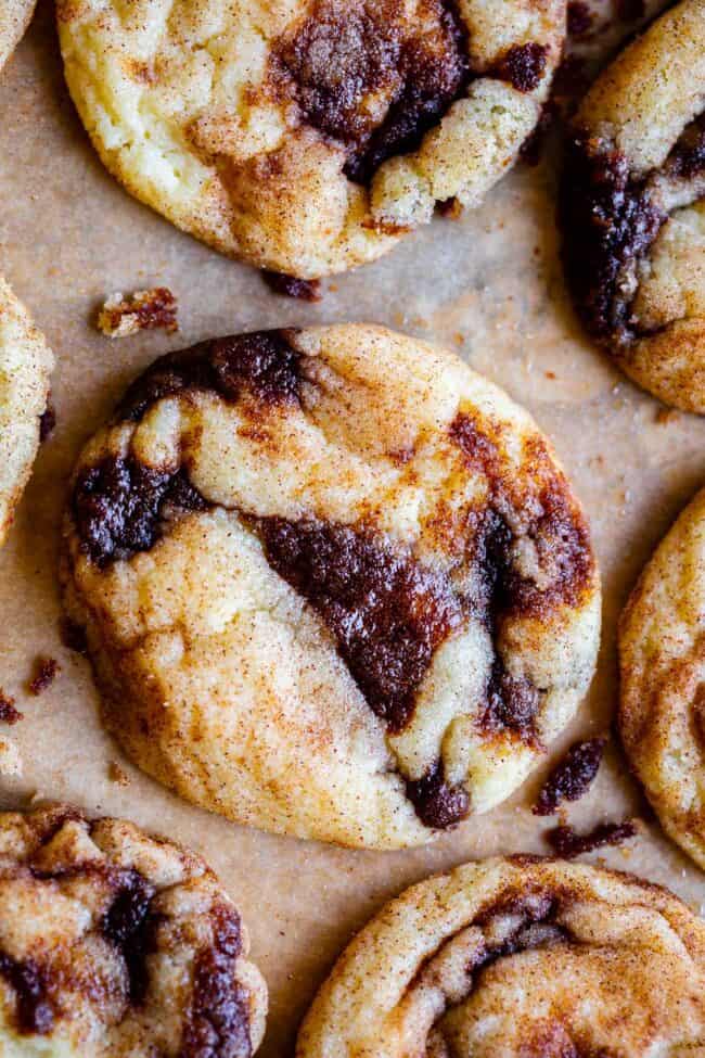 cinnamon roll cookies on parchment paper shot from overhead