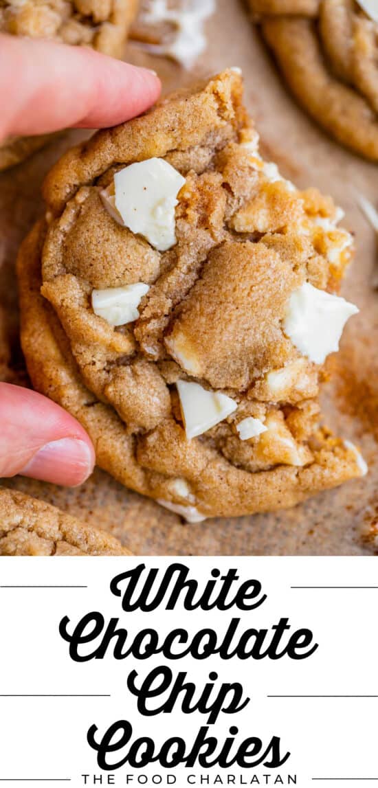 white chocolate cookies with hand holding it up