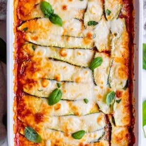 zucchini lasagna recipe in a white casserole dish