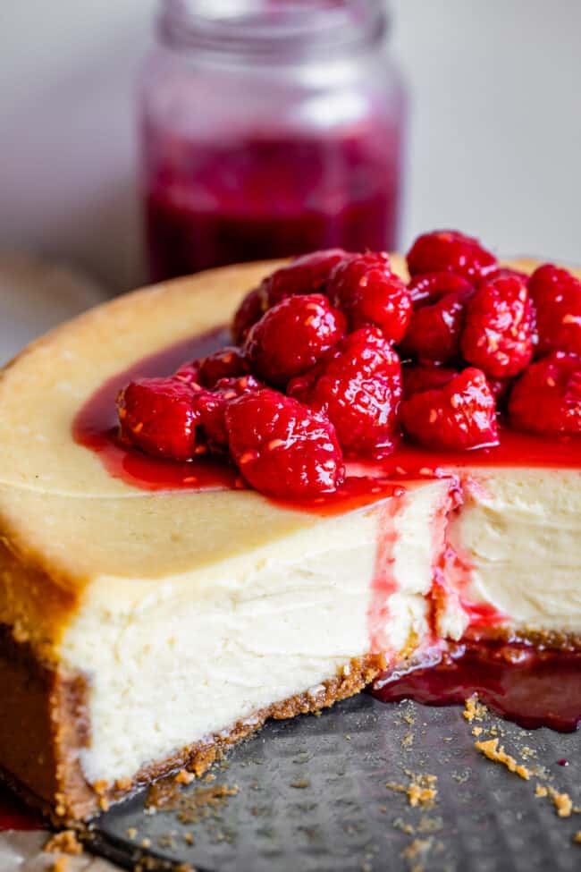 cheesecake made with no water bath, in the pan with raspberries