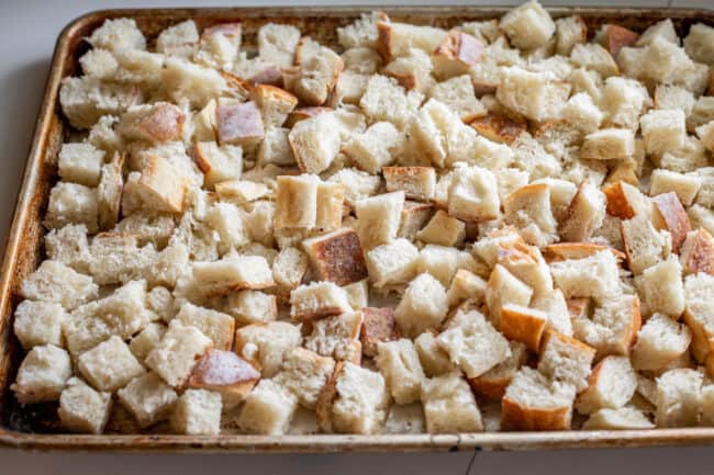 cubed bread on a sheet pan