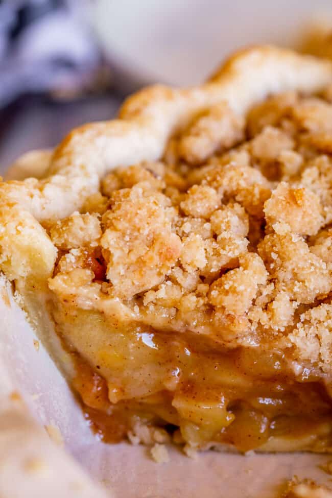 crumble top dutch apple pie in a pie plate.
