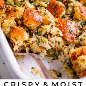 traditional stuffing recipe in a white dish with a spoon