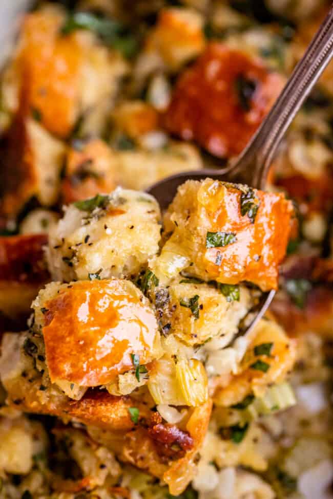 thanksgiving stuffing with herbs on a spoon