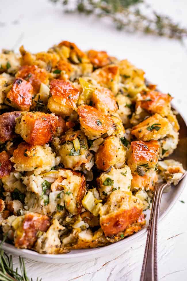 thanksgiving stuffing recipe in a bowl with a spoon