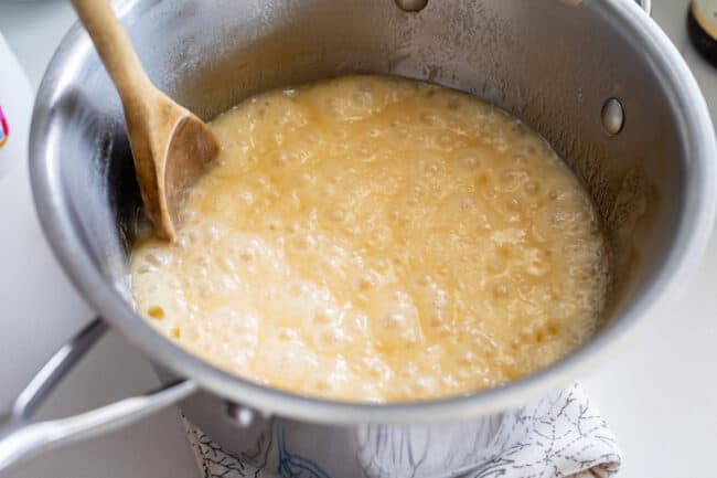 a rolling boil in a pot: sugar, butter, evaporated milk.