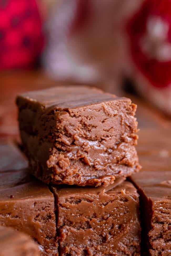 square of marshmallow fluff fudge sitting on top of more fudge.