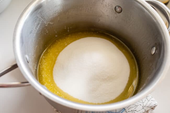granulated sugar added to the center of a pot of melted butter.
