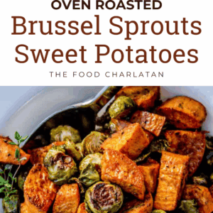 Chopped Brussels sprouts and oven roasted sweet potatoes on a baking sheet, seasoned and cooked to perfection. Finished dish garnished with fresh herbs on a serving plate.