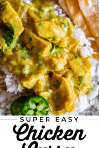 indian chicken curry on rice with jalapeno and roti