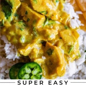 indian chicken curry on rice with jalapeno and roti