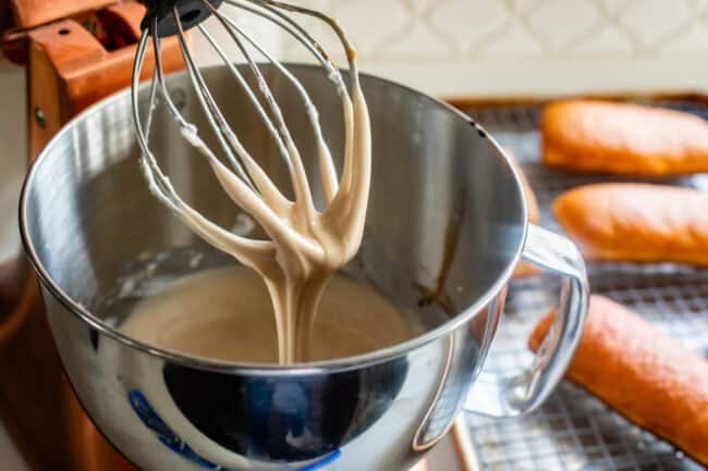 maple glaze in a stand mixer with the whisk attachment