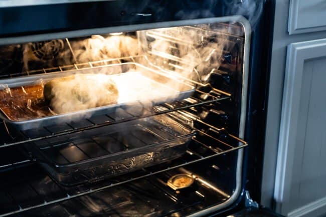 dough in the oven with a pan of boiling water underneath