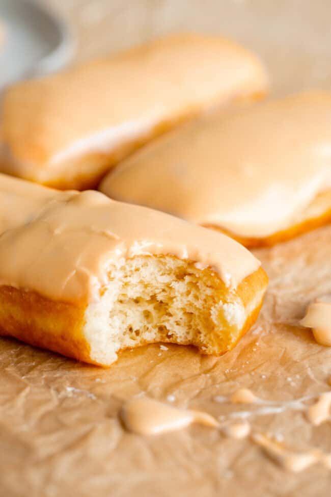 maple bar with maple donut glaze on parchment paper