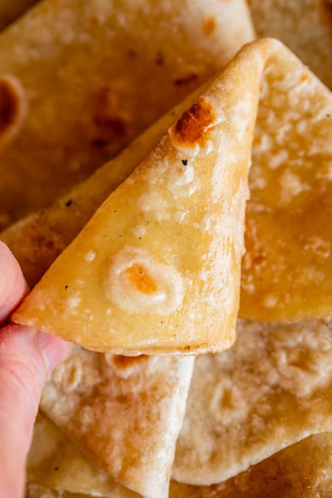 hand folding rot bread to show softness