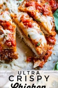 sliced chicken parm with cheese and sauce