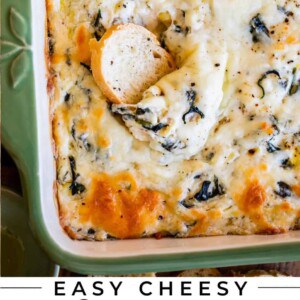 spinach artichoke dip recipe in a green casserole dish