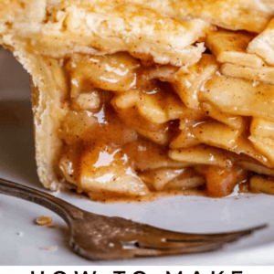 A close-up of a slice of homemade apple pie with a golden flaky crust and cinnamon apple filling, placed on a plate with a fork. Text below reads: Homemade apple pie. The Food Charlatan.