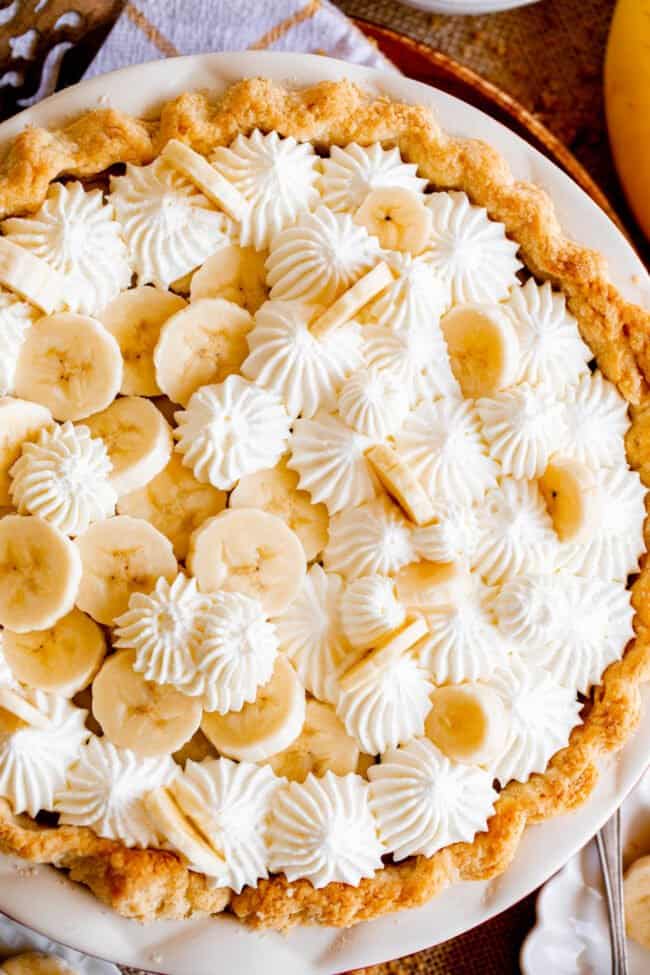 overhead shot of easy banana cream pie recipe with whipped cream.