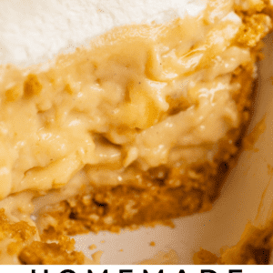 cross section of banana cream pie in a white pie pan, close up.