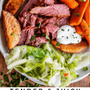 corned beef and cabbage on a plate with potatoes and carrots