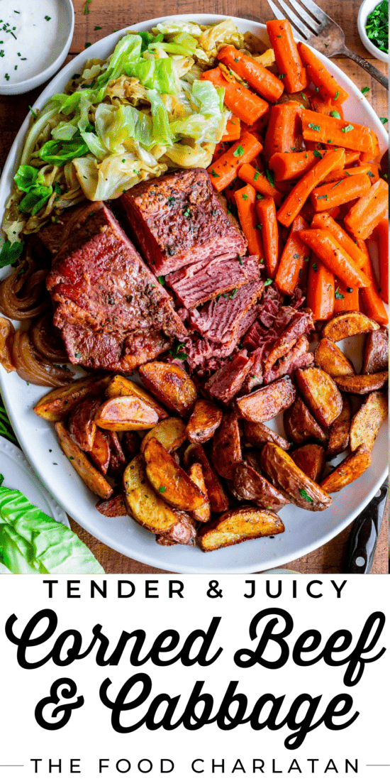 crockpot corned beef on a large platter with carrots potatoes and cabbage