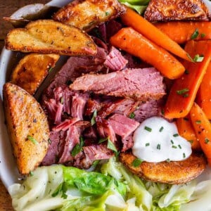 corned beef and cabbage on a plate with potatoes and carrots