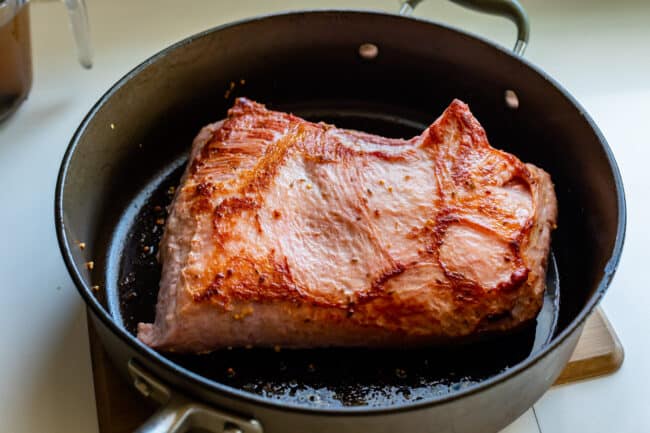 corned beef seared in a pan.